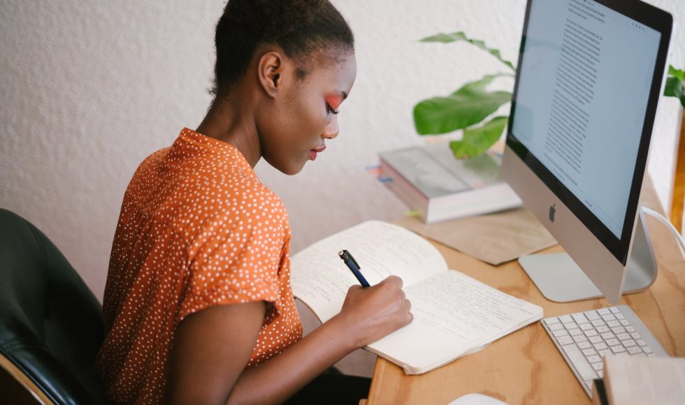 Student taking notes