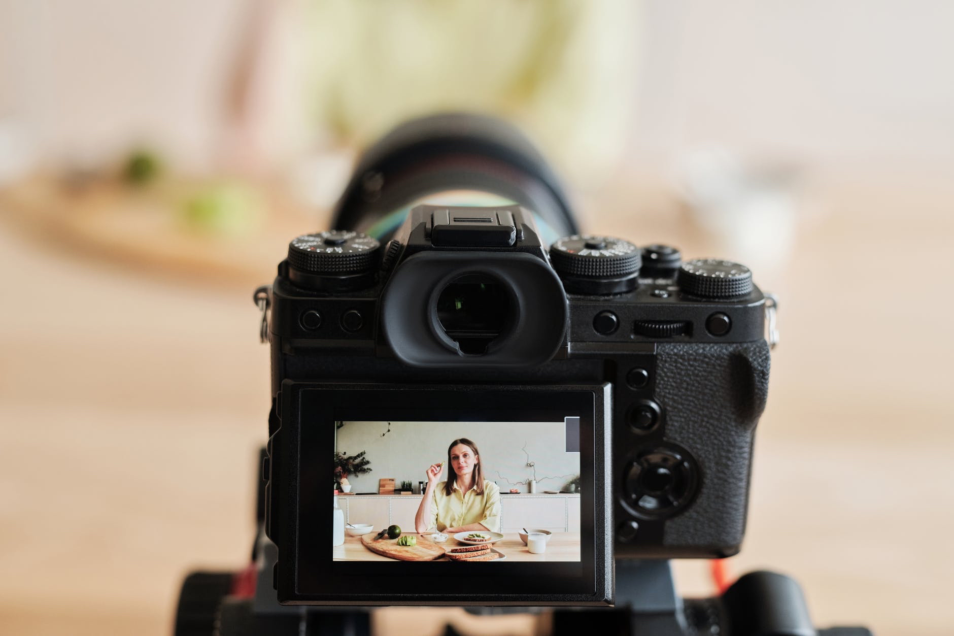 Image of digital camera focusing on person.