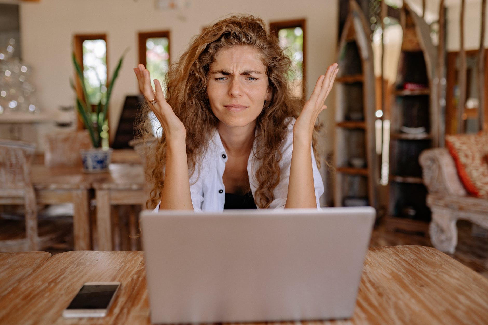 Photo of woman frustrated at laptop