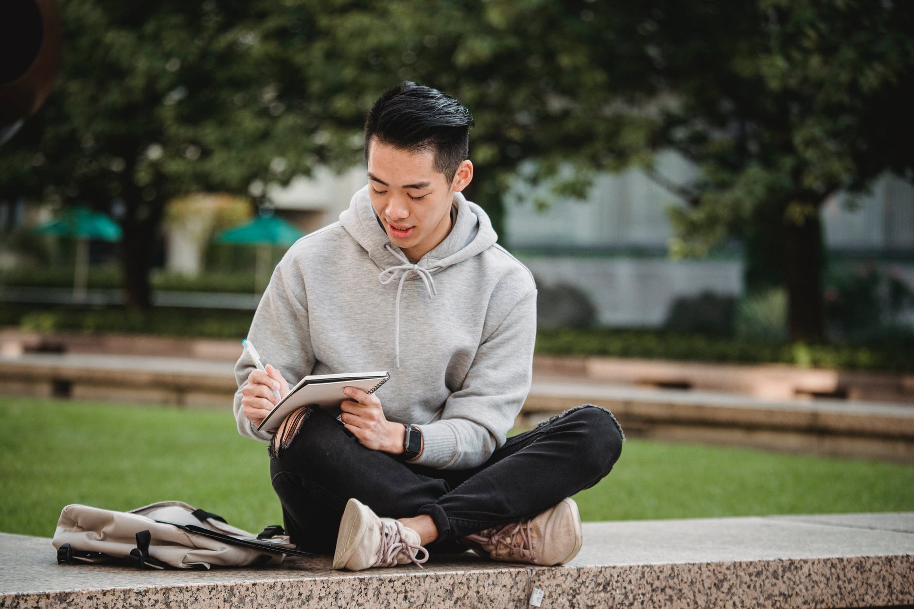 Man focusing and taking notes