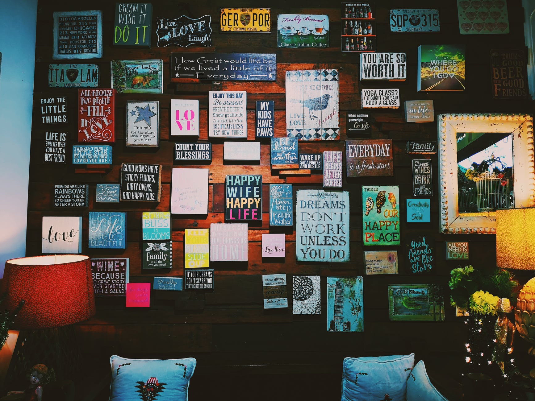 Wall with numerous artistic posts.