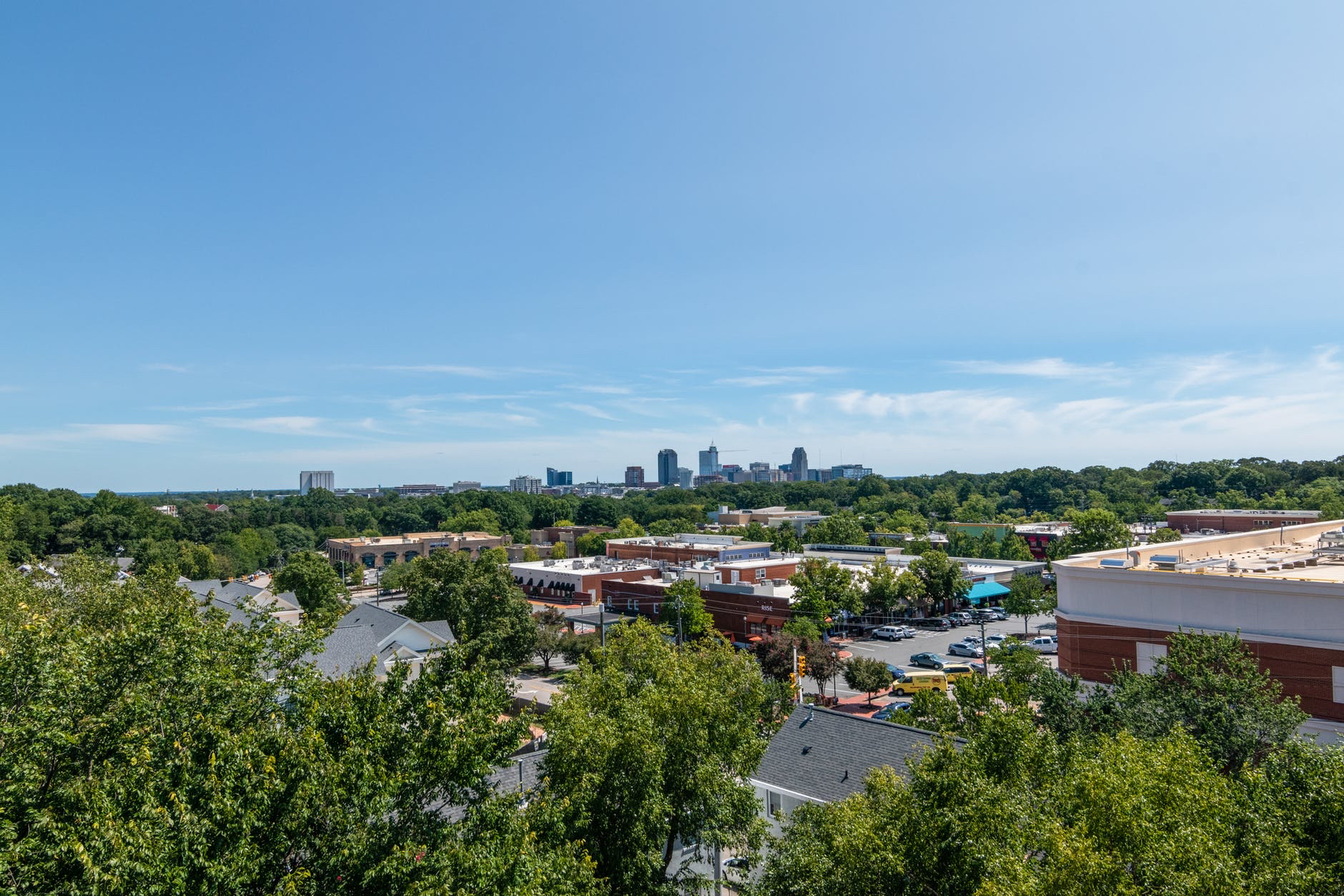 Photo of Raleigh, NC with skyline visible in the distance.