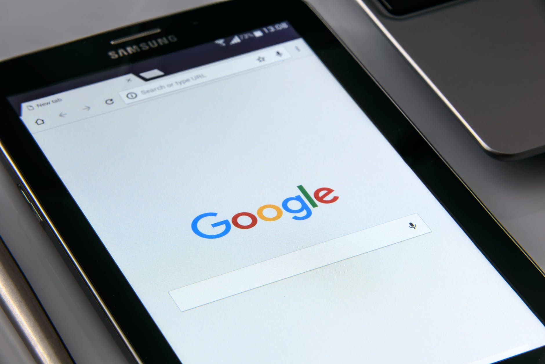 Tablet with Google homepage.