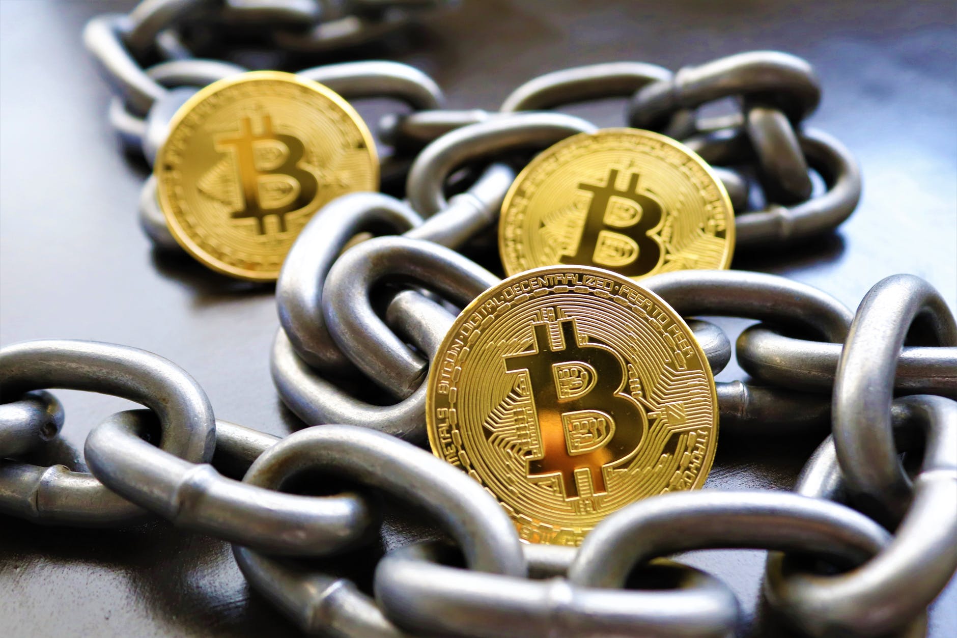 Three bitcoins and a chain