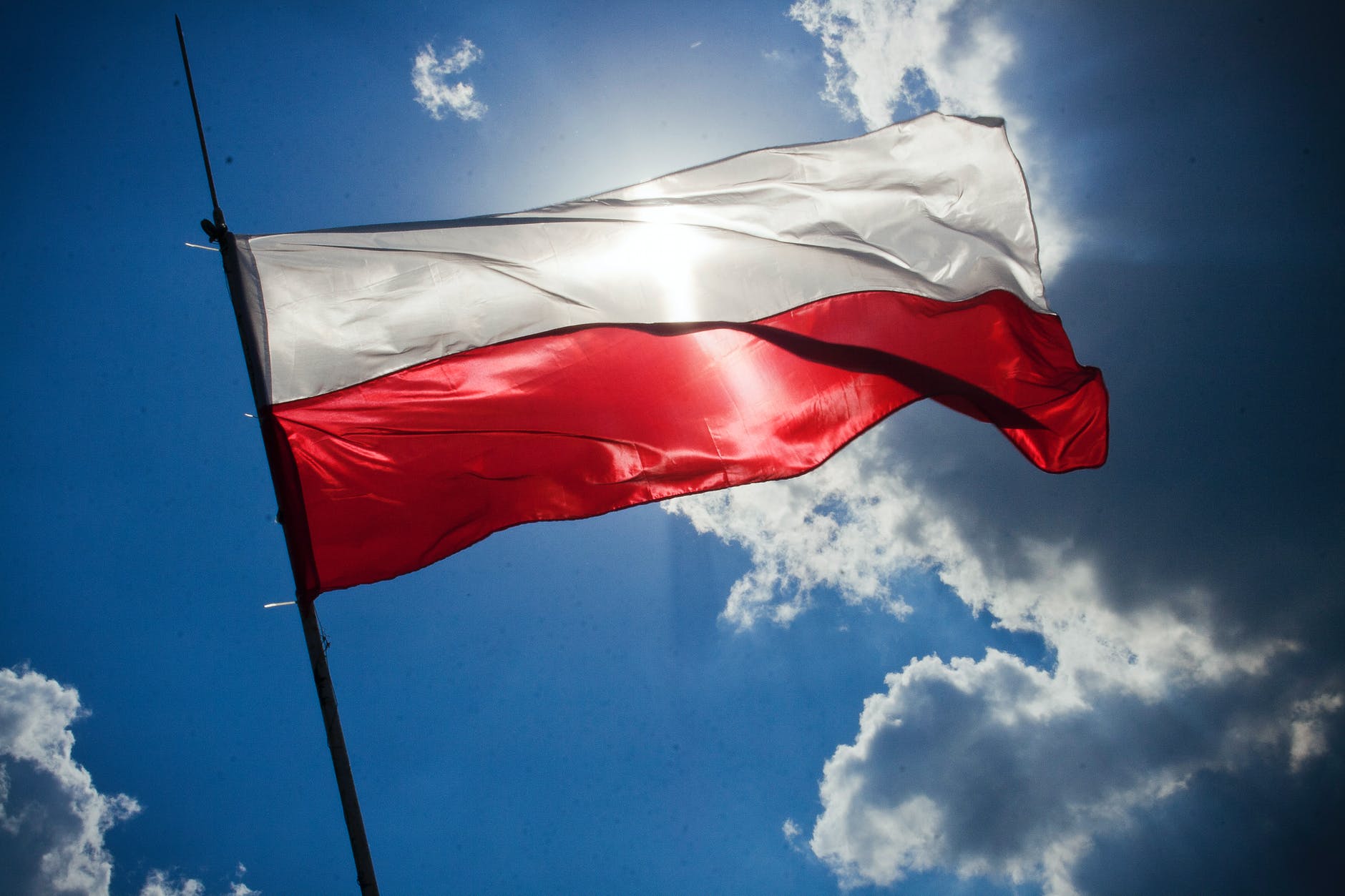 Flag of Poland and sunshine