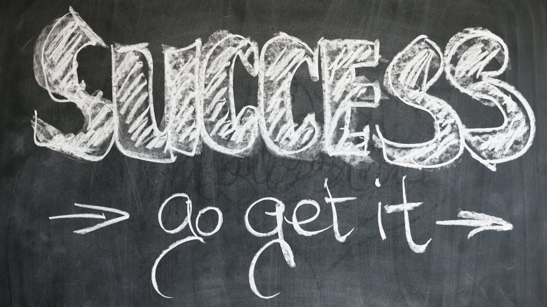 Chalkboard with "success, go get it"