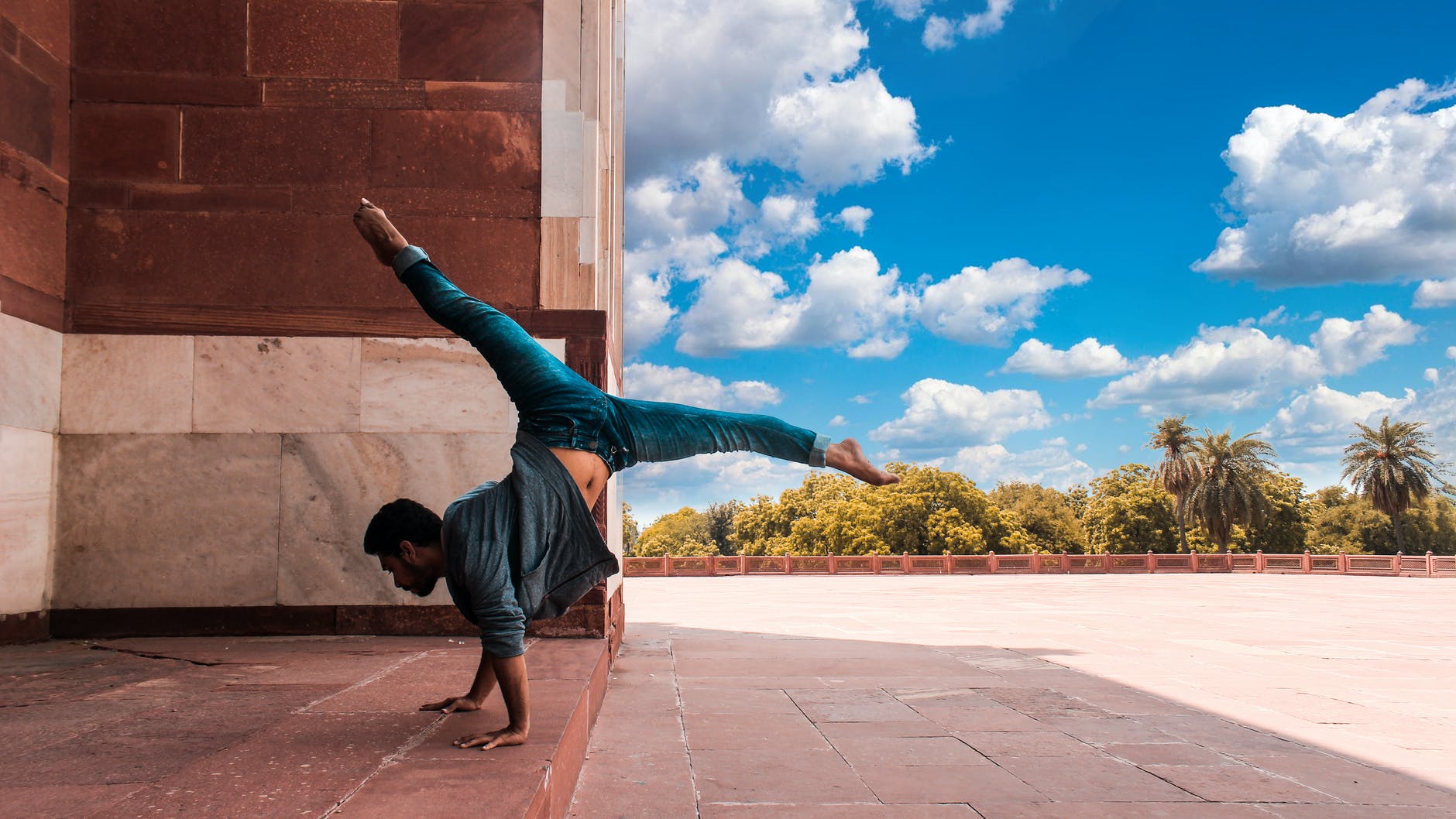 person doing handstand outside 