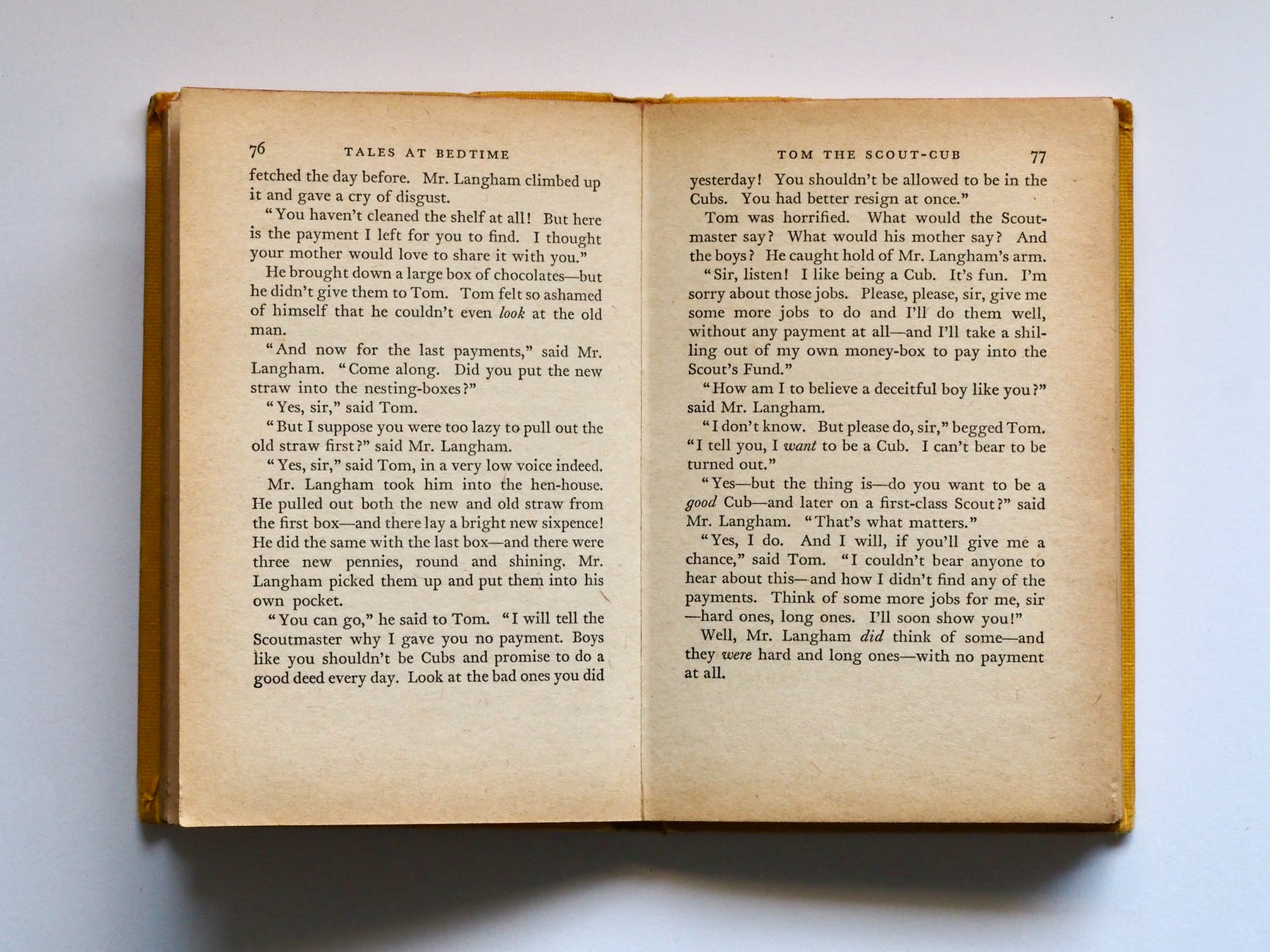 Weathered pages of an open book.