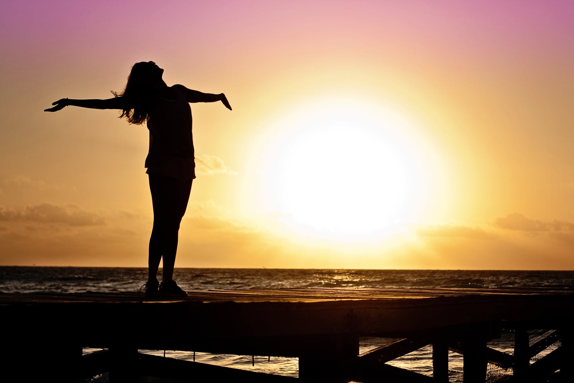 Female silhouette at sunset