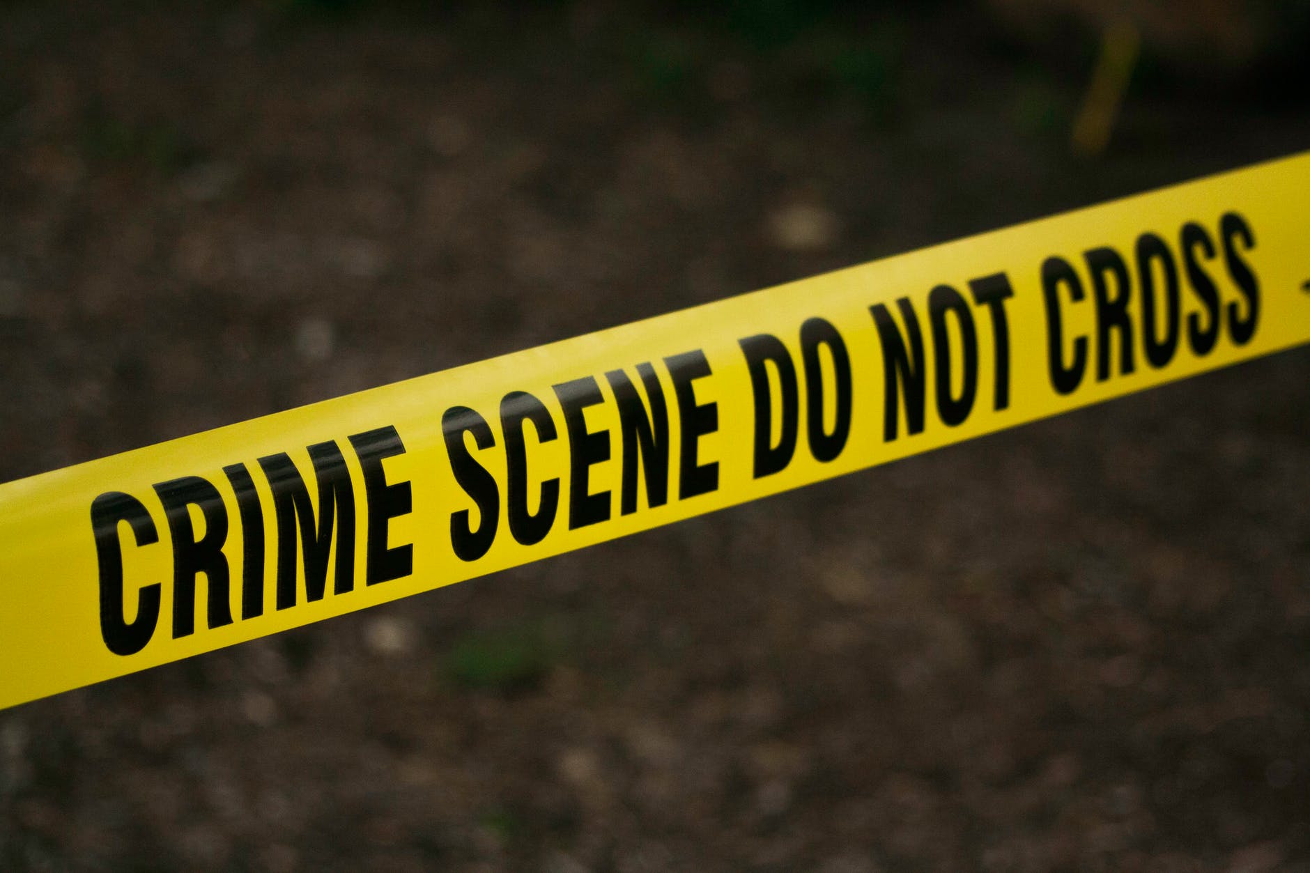 Yellow "Crime Scene Do not cross" tape.