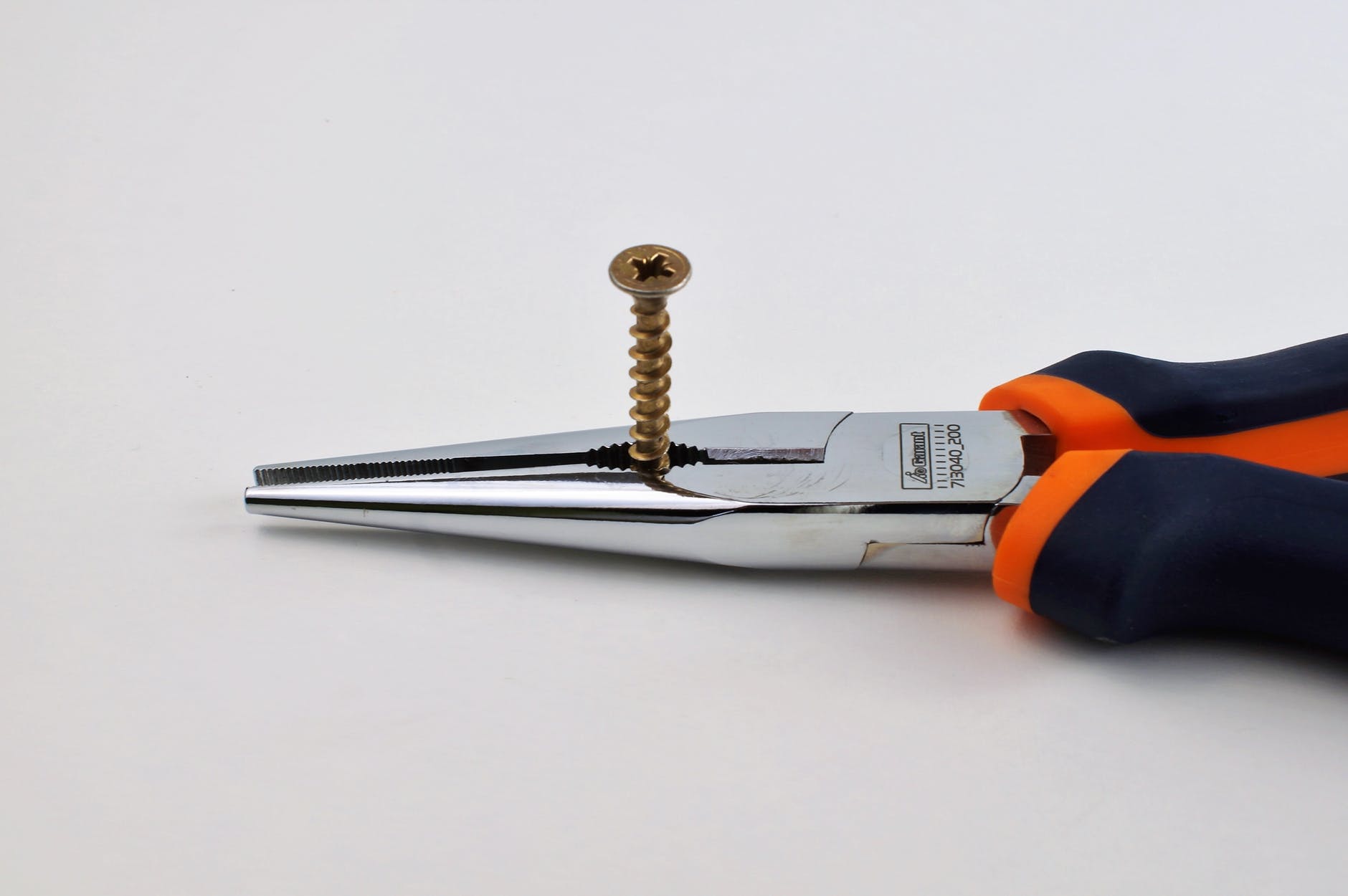 pliers removing screw