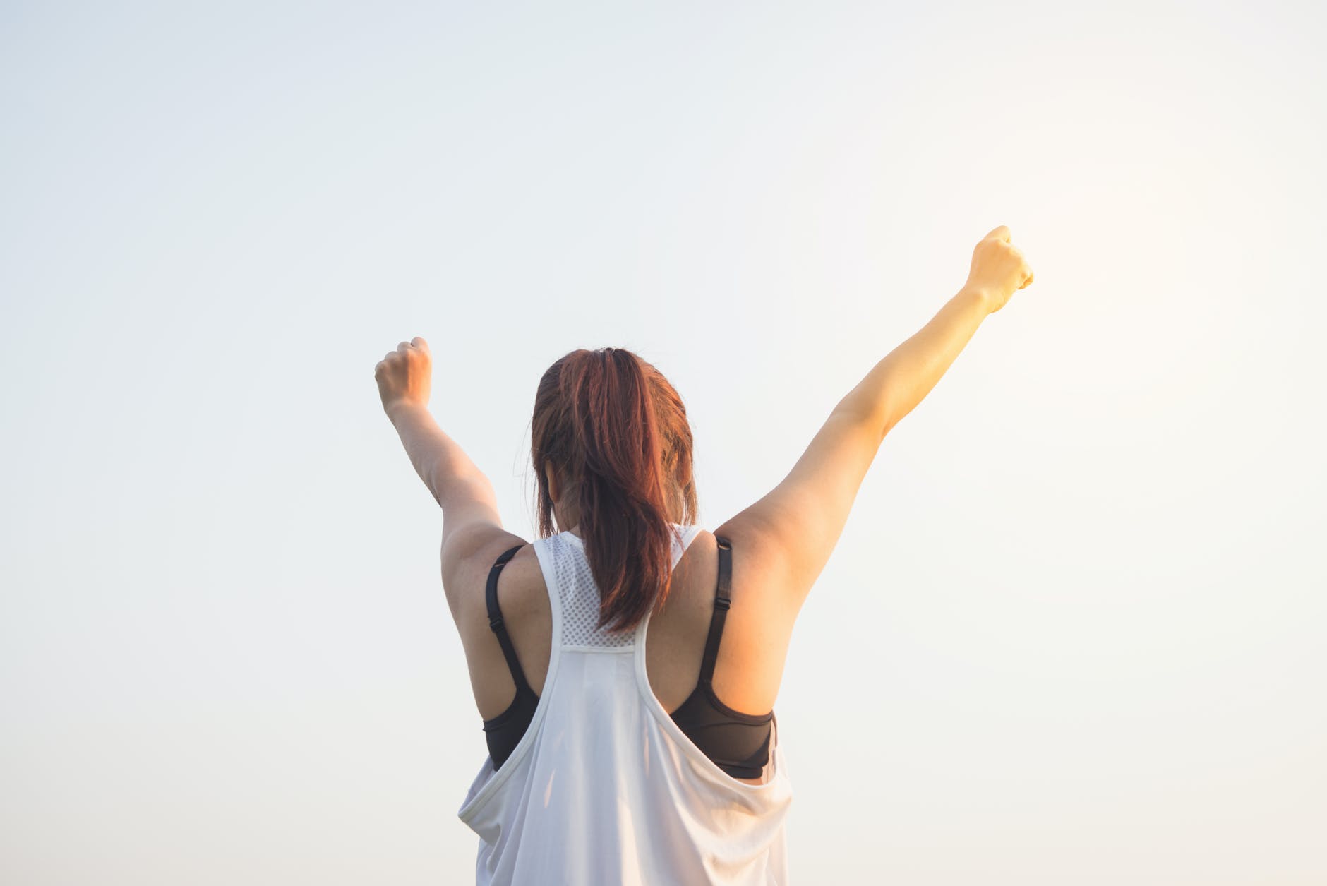 Woman with ponytail stretching