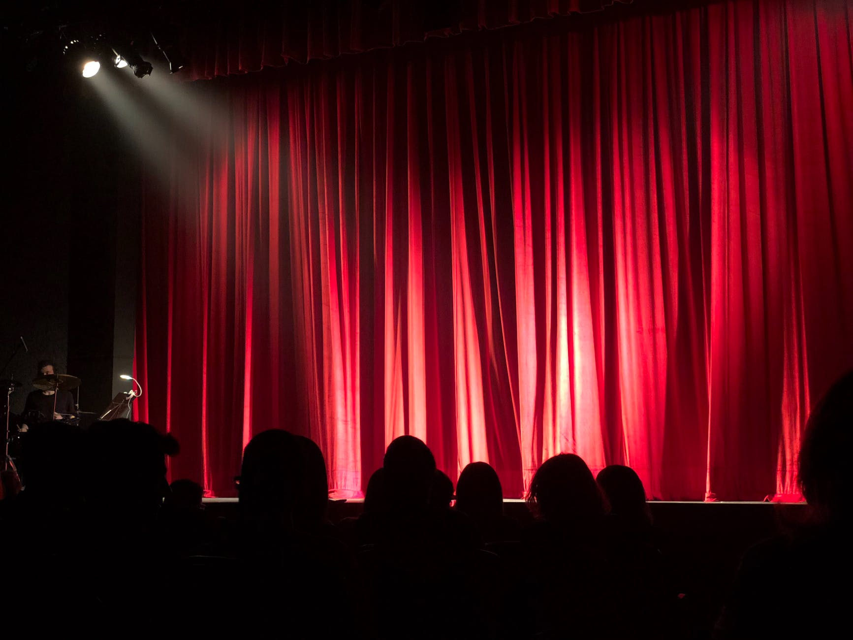 stage with red curtain