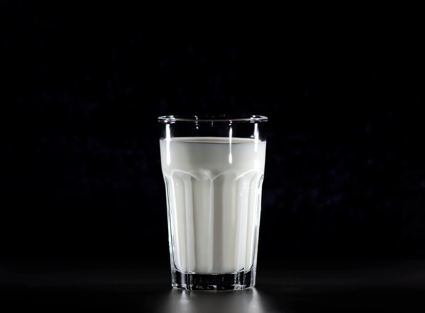 glass of white liquid, likely yogurt