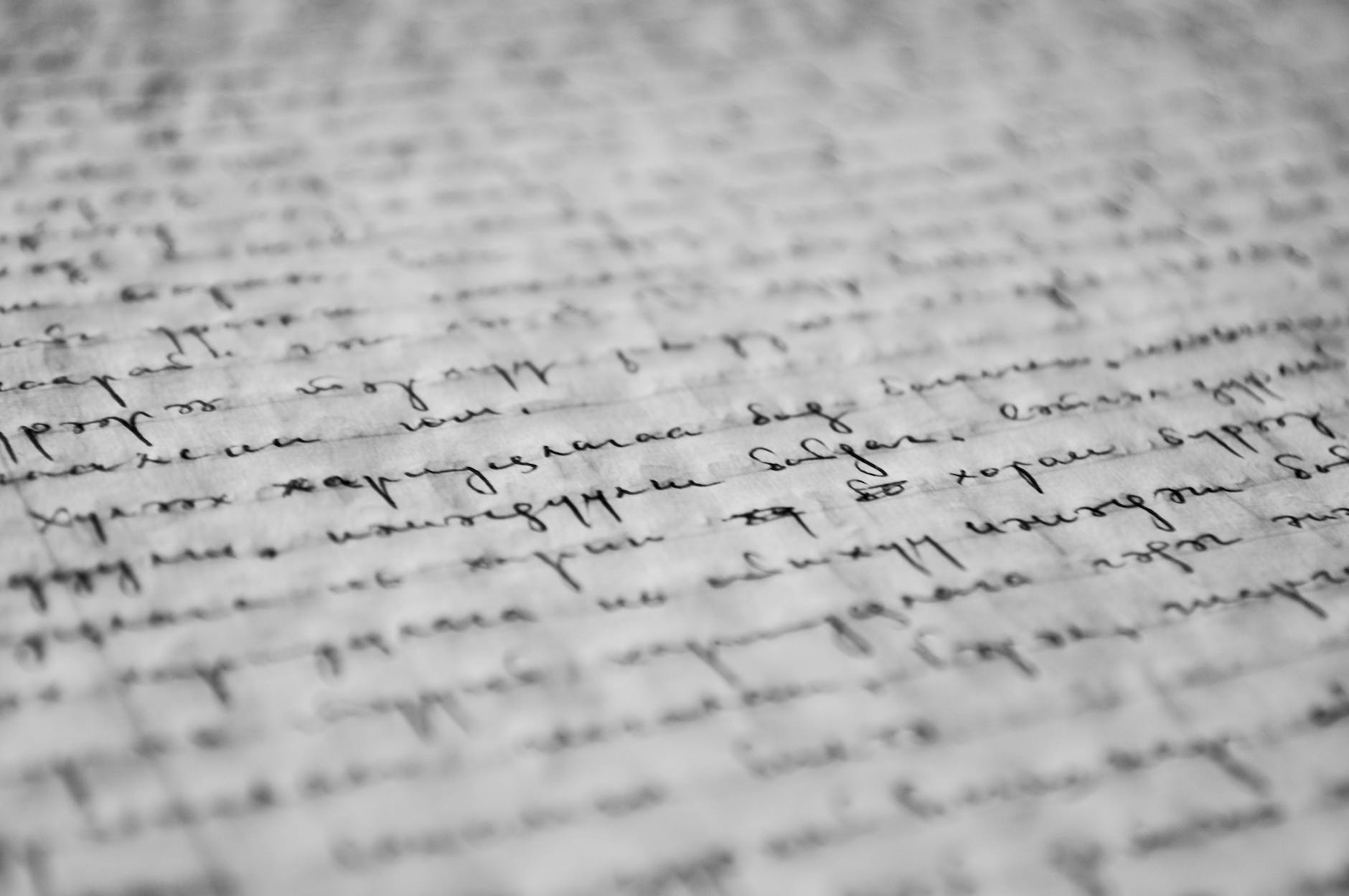 notebook with cursive text in black ink