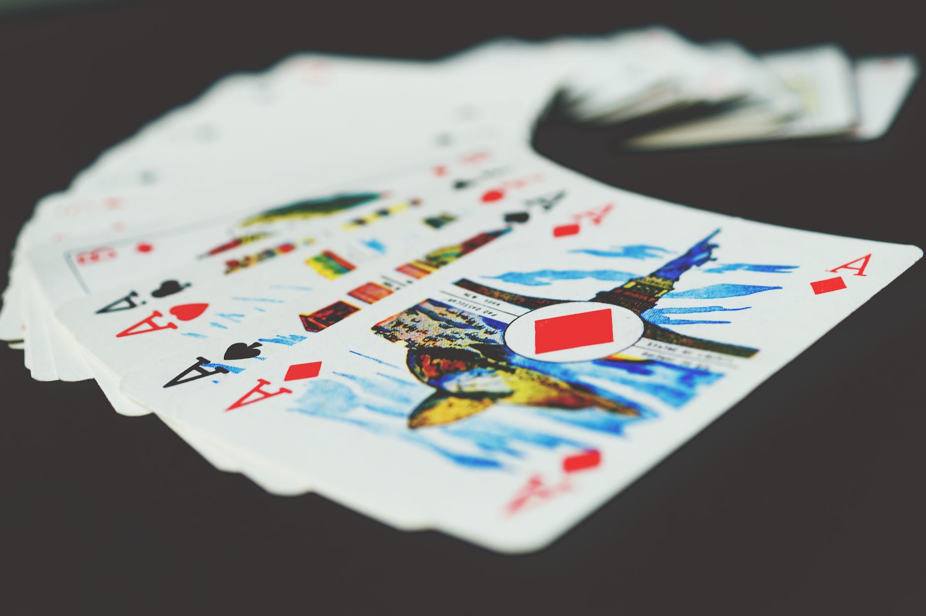 deck of cards spread out on table