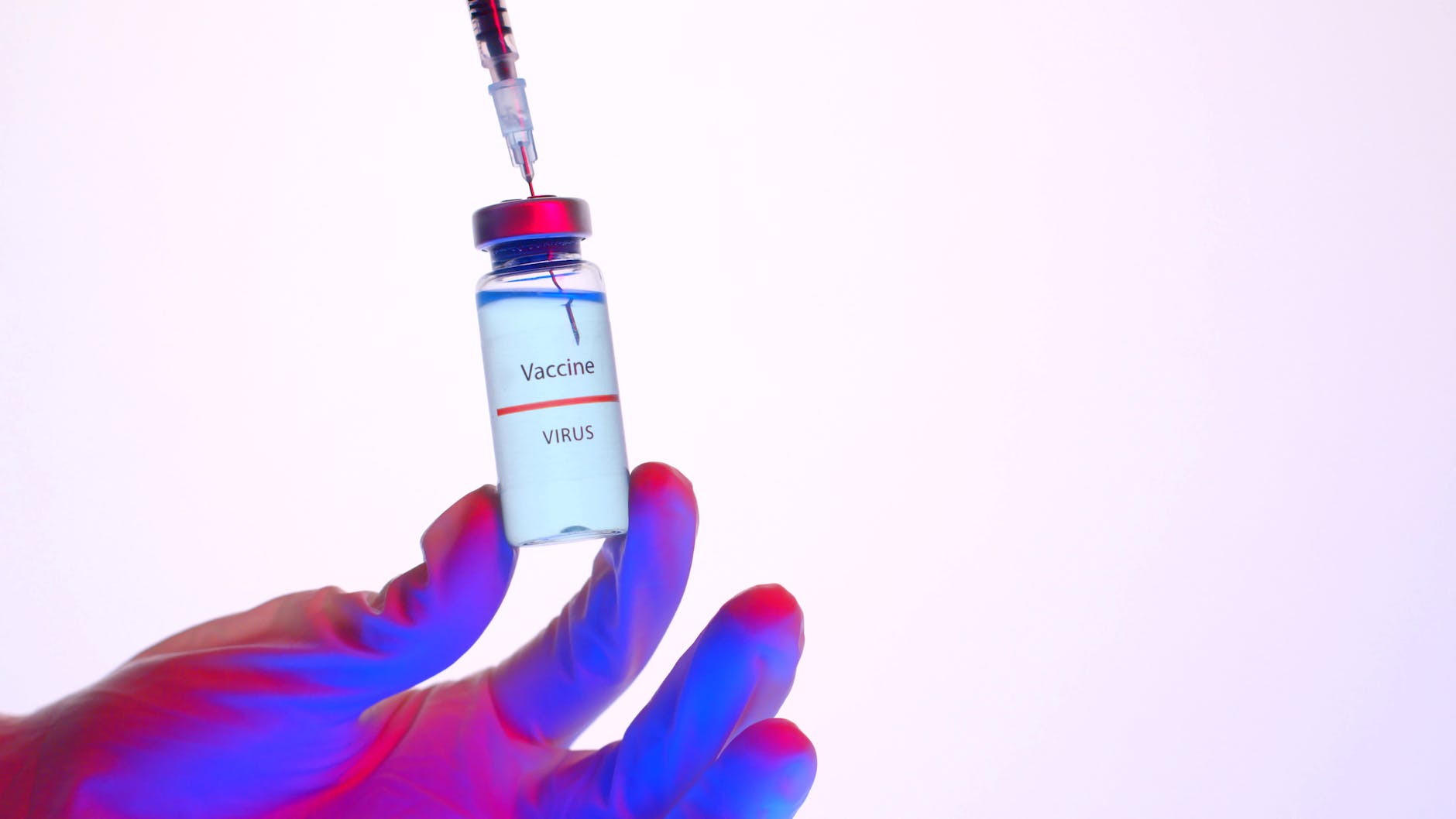 vial with vaccine and needle