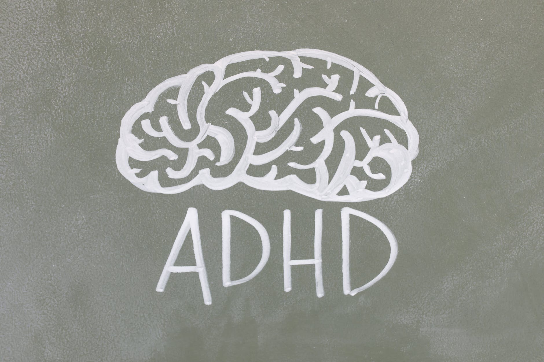 illustration of brain with text "ADHD"