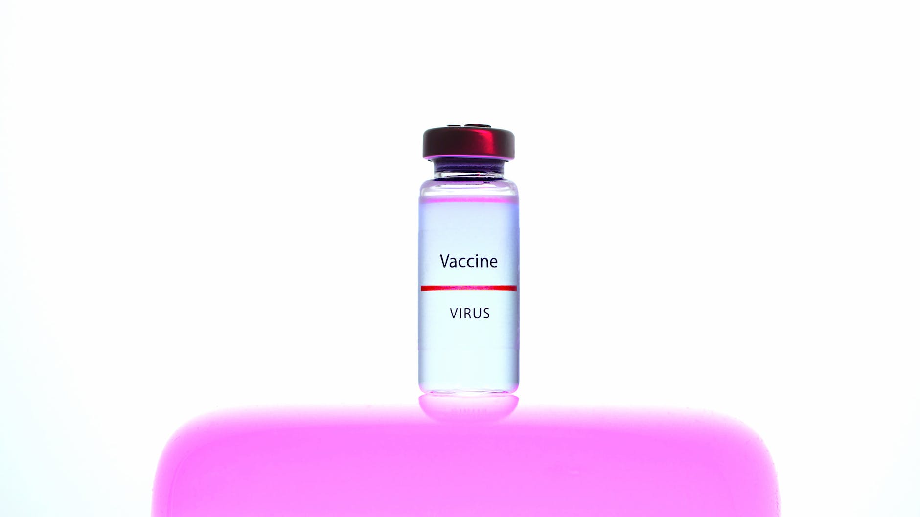 vial labeled vaccine and virus.