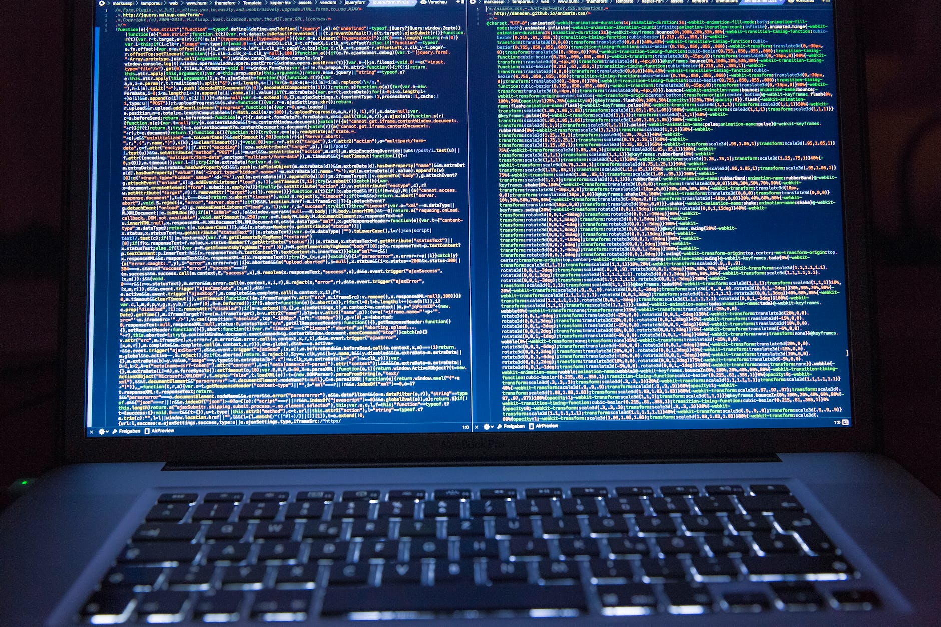 laptop with computer code