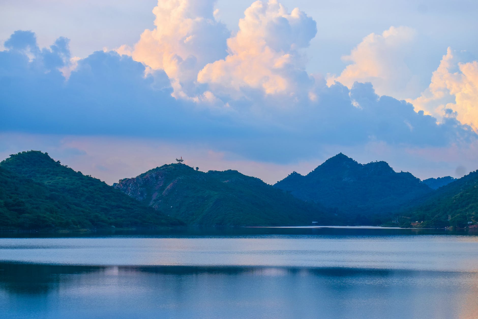 landscape of hills around lake
