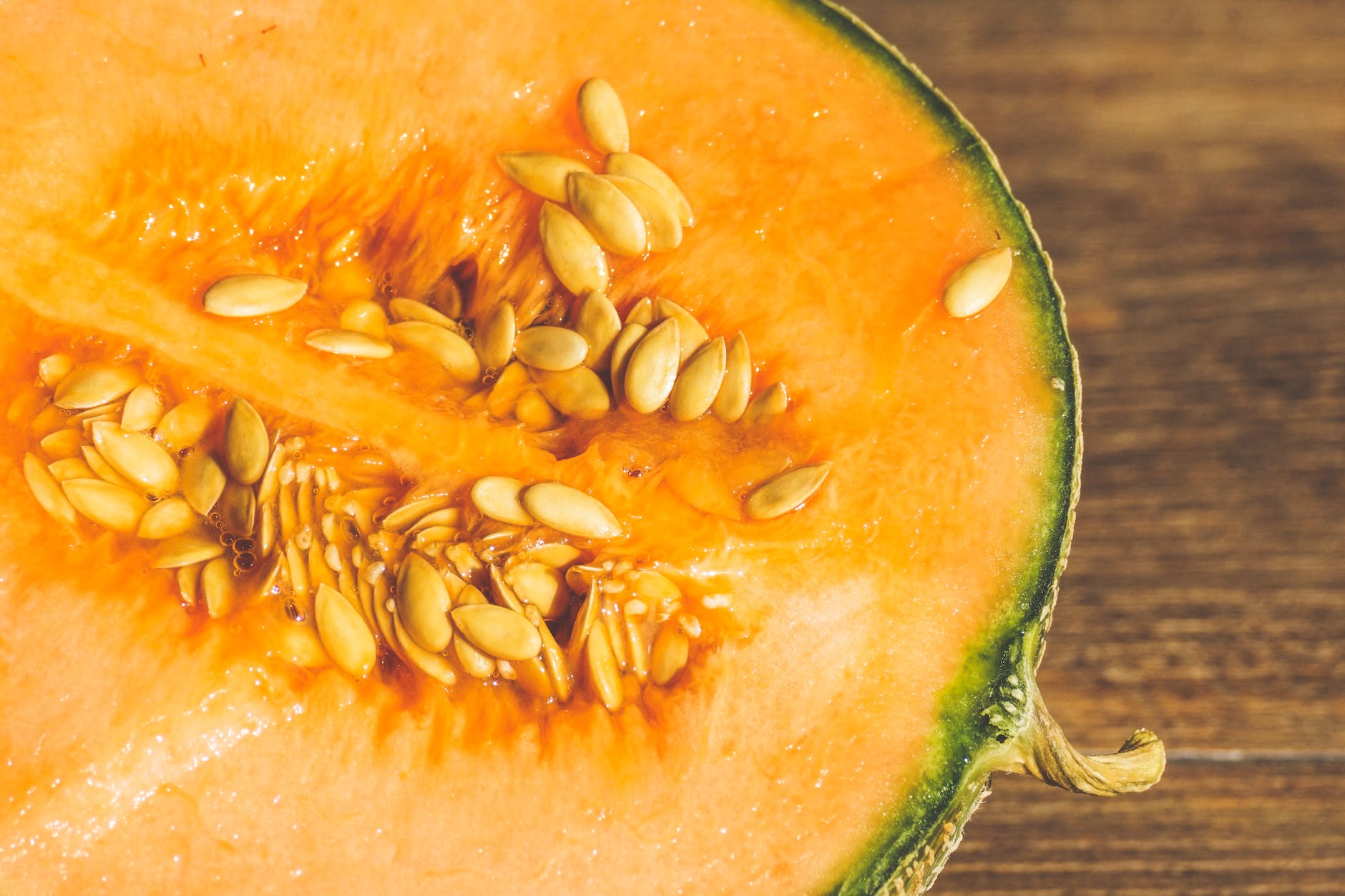orange melon cut in half