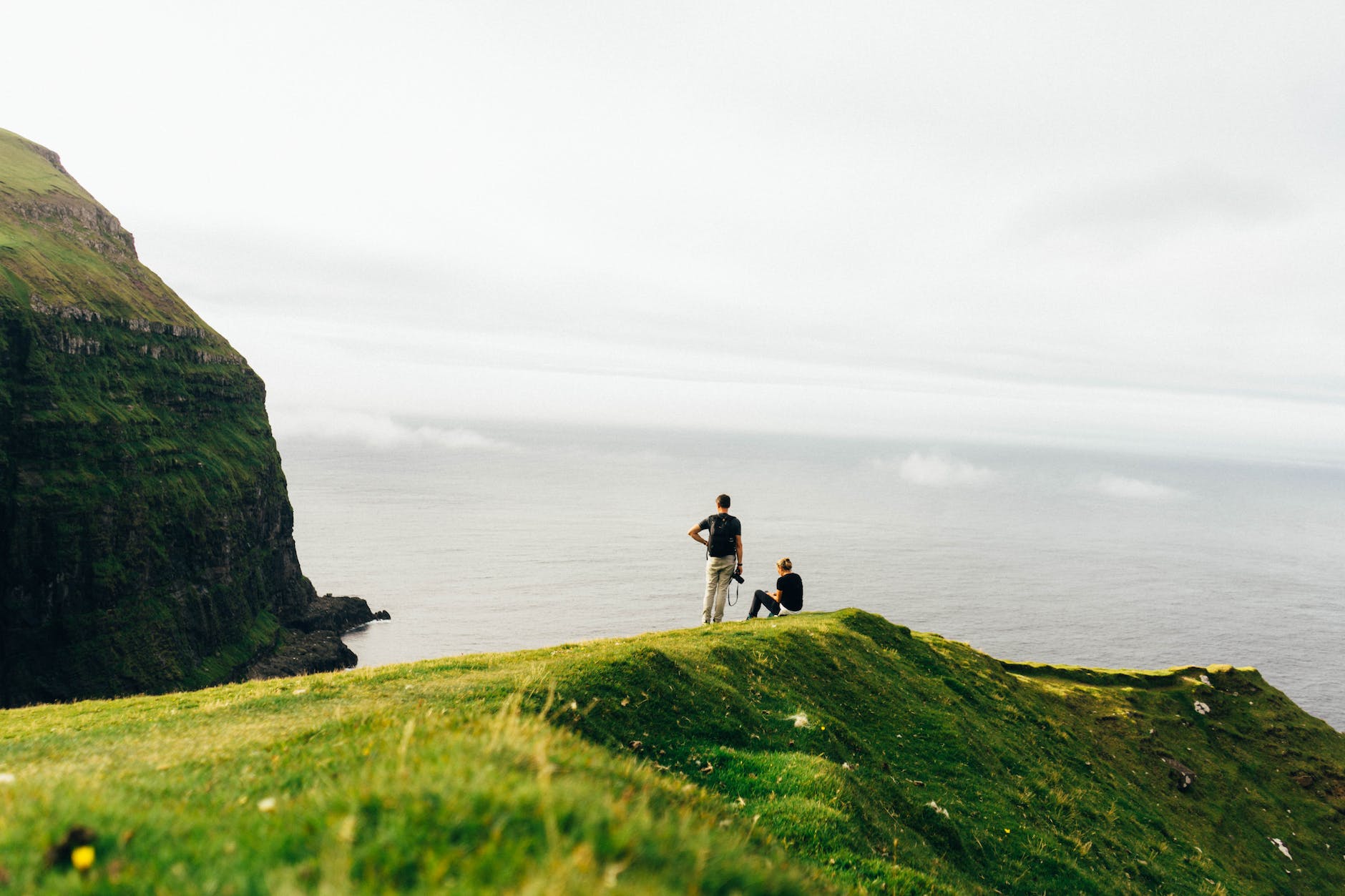 people by seaside in the Faroe Islands