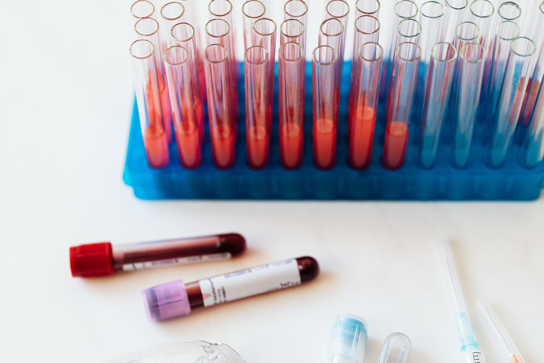 set of vials and test tubes of blood