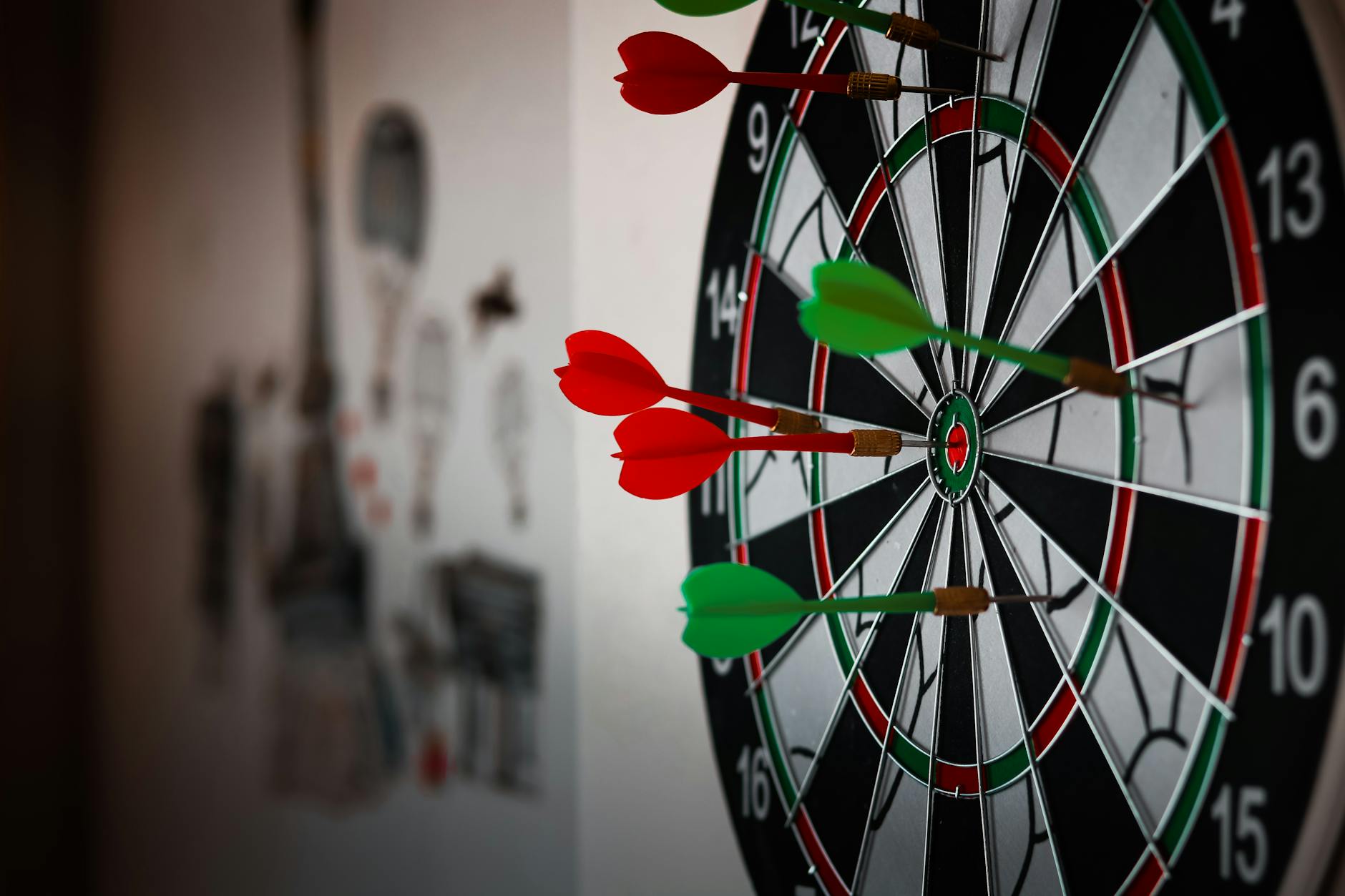 dart board with green and red darts