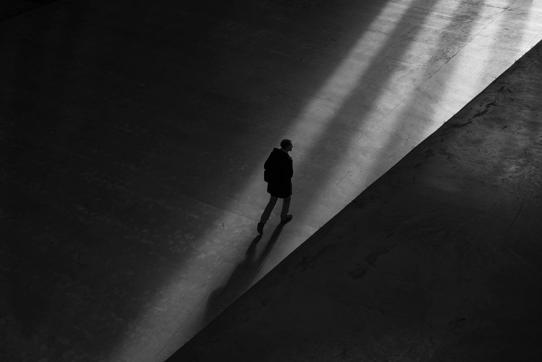 person walking in the dark