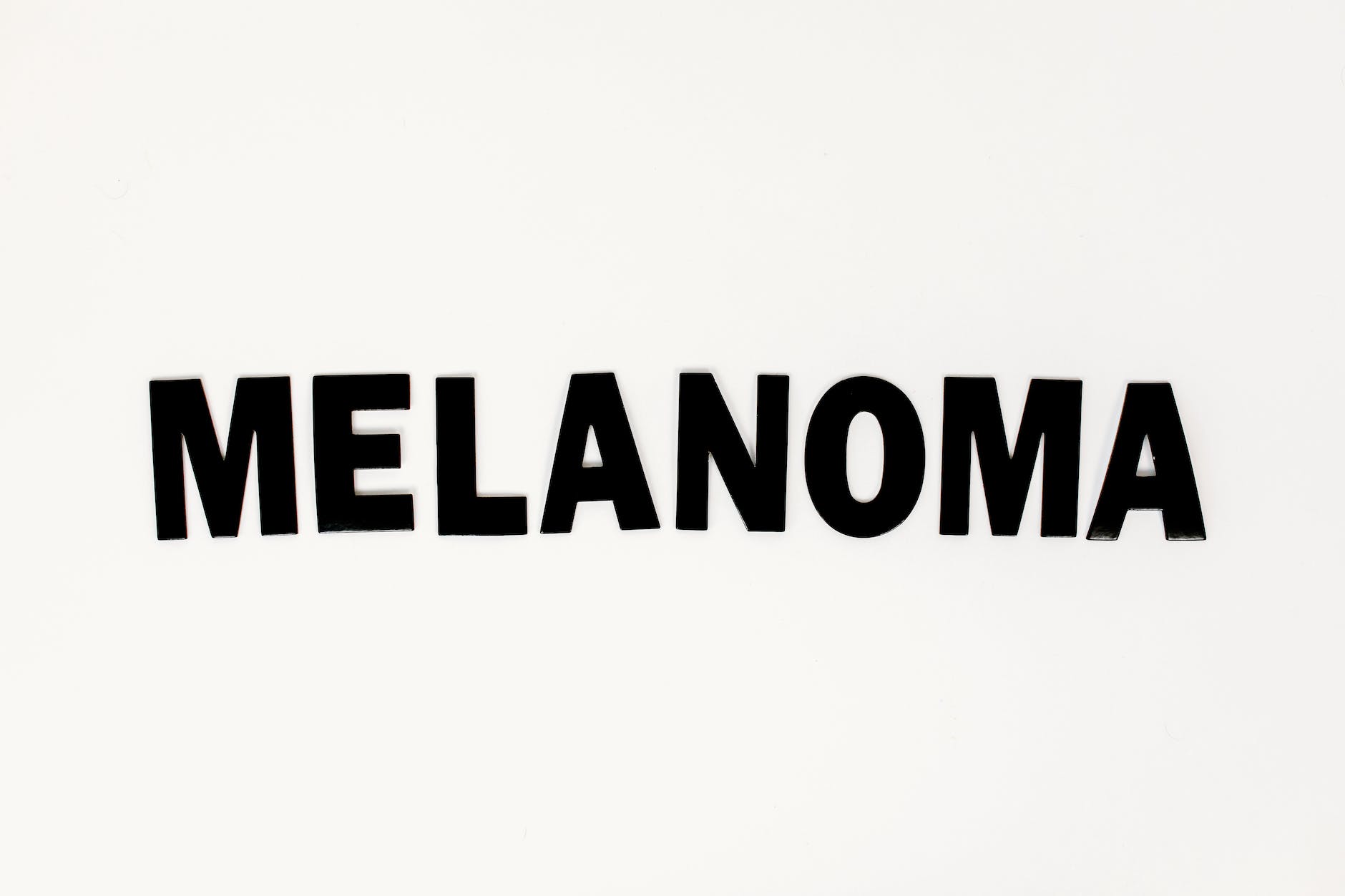 Melanoma text on white background