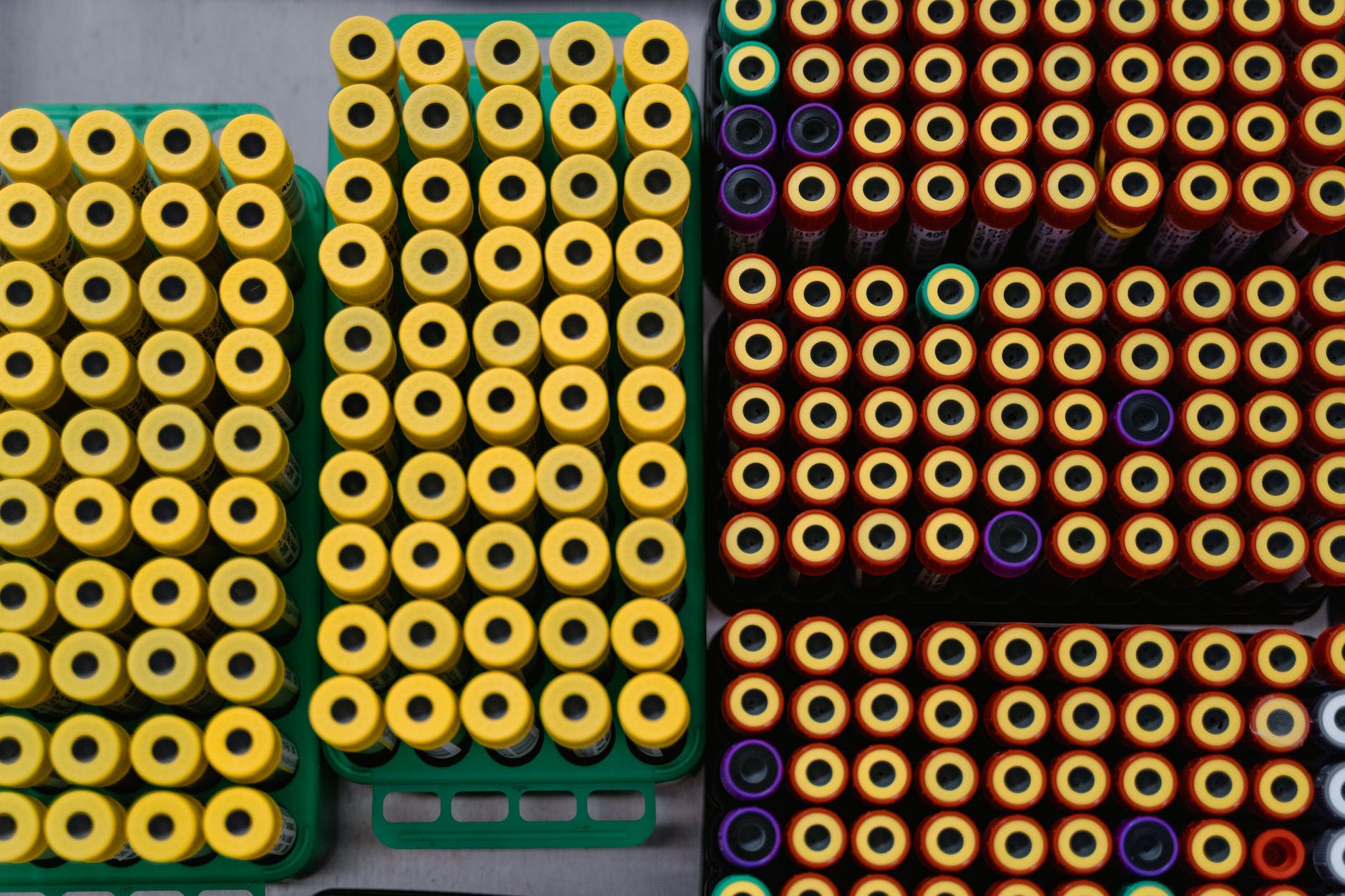 top down view of yellow caps of blood samples