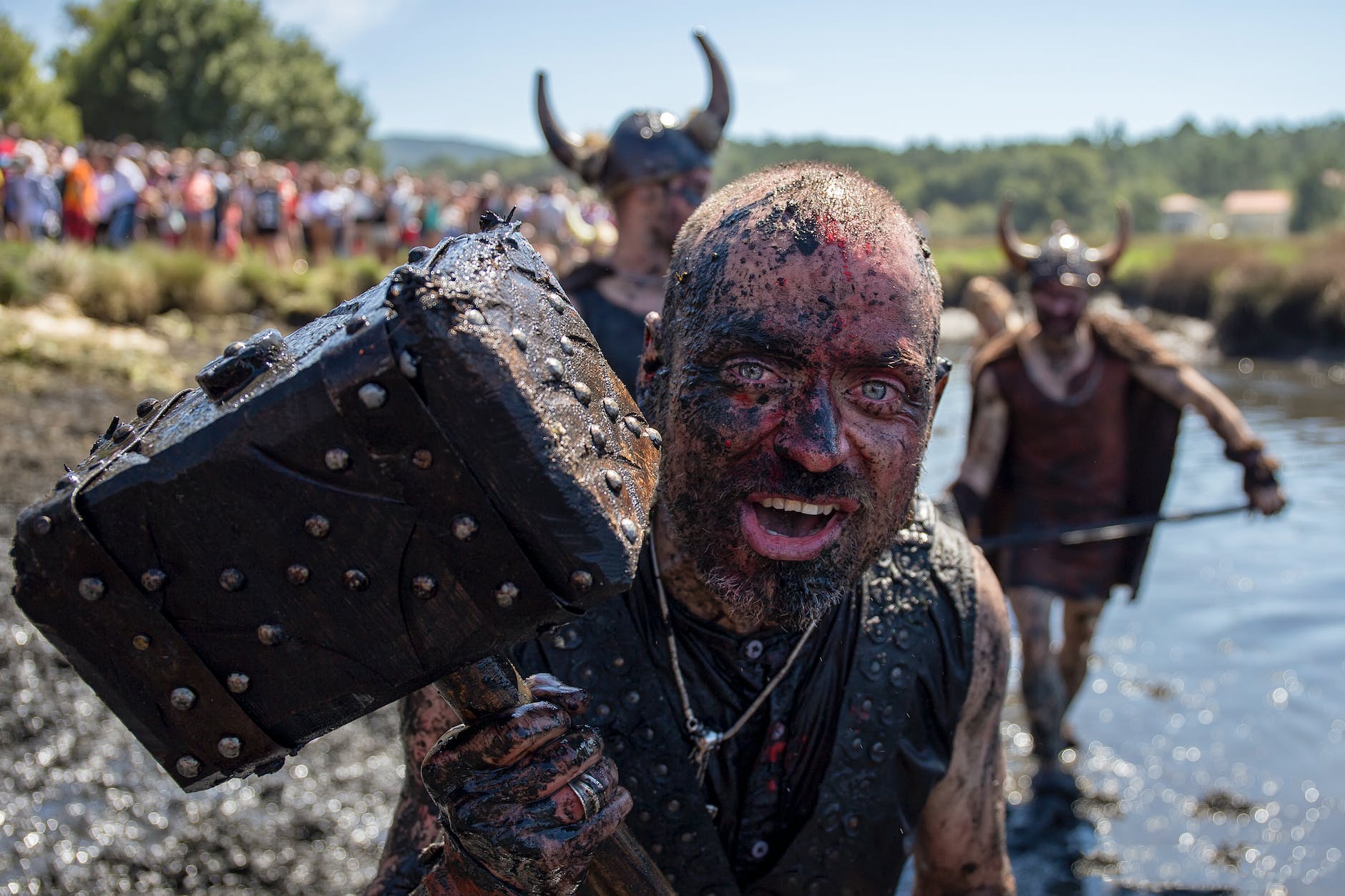 participants running in the mud.